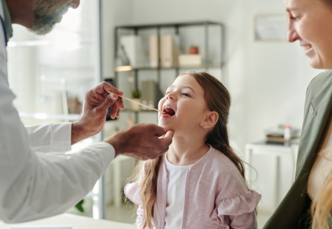 ENT Doctor with a Child patient cnv